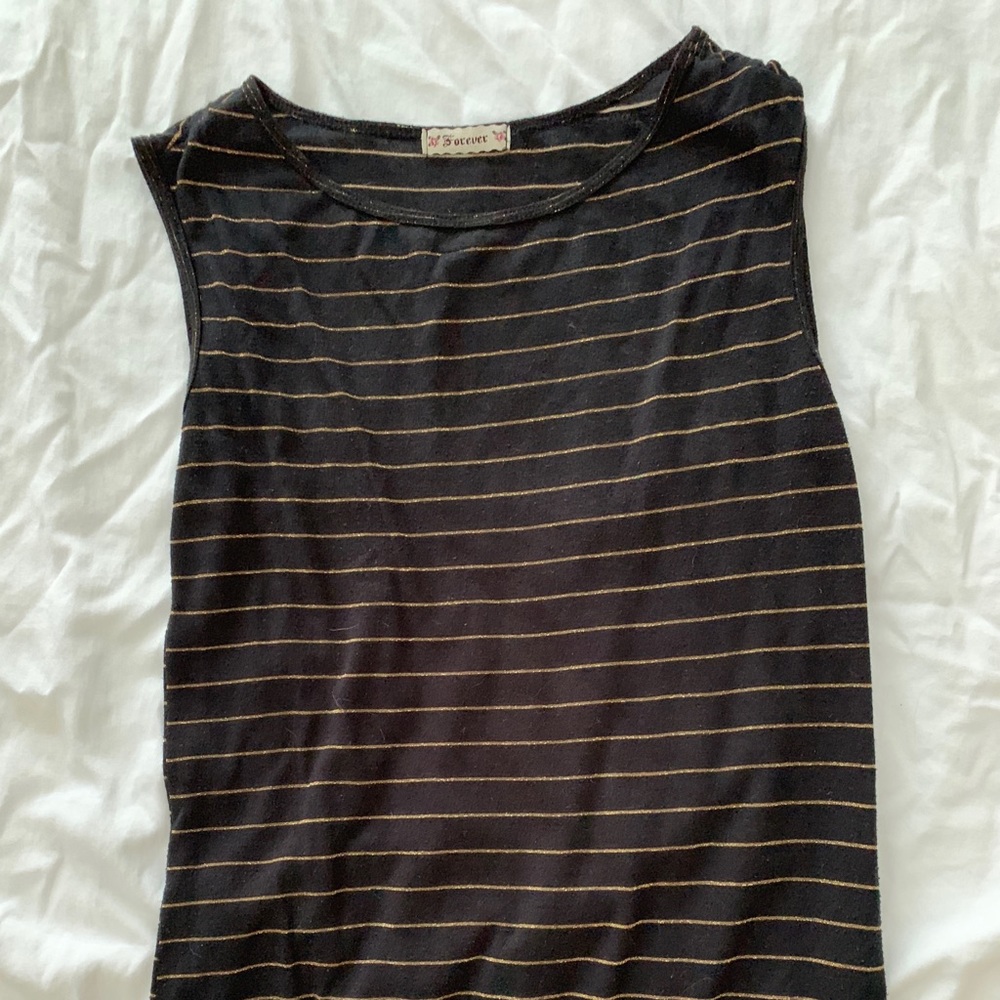 Black and gold sleeveless blouse